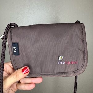 Sherpani Zoe Brown Crossbody Wallet with Daisy Logo